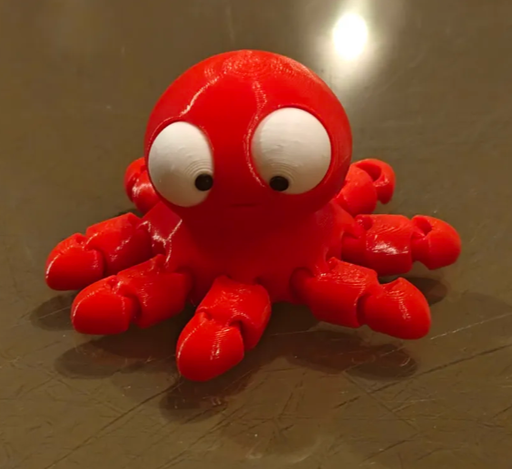 Mini Flexi Octopus con ojos móviles, detalle de la figura de colección Gufis.